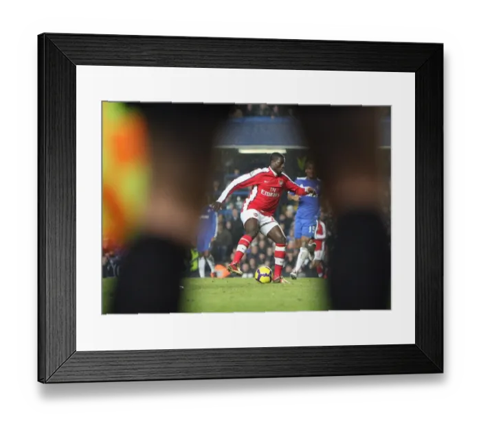 Framed Print : Emmanuel Eboue (Arsenal). Chelsea 2: 0 Arsenal. Barclays Premier League