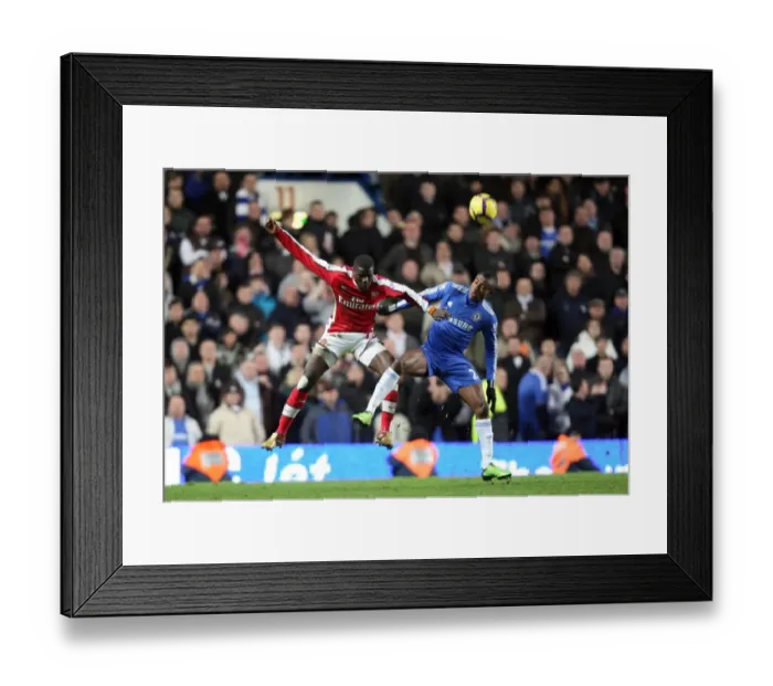 Framed Print : Emmanuel Eboue (Arsenal) Salomon Kalou (Chelsea). Chelsea 2: 0 Arsenal. Barclays Premier League Framed Print : Emmanuel Eboue (Arsenal) Salomon Kalou (Chelsea). Chelsea 2: 0 Arsenal. Barclays Premier League