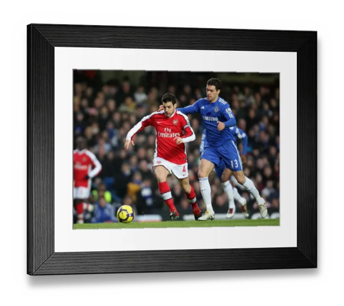 Framed Print : Fabregas vs Ballack: Chelsea's Victory in the Barclays Premier League (2010) Framed Print : Fabregas vs Ballack: Chelsea's Victory in the Barclays Premier League (2010)