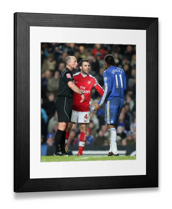Framed Print : Cesc Fabregas (Arsenal) Didier Drogba (Chelsea) and Referee Mike Dean. Chelsea 2 Framed Print : Cesc Fabregas (Arsenal) Didier Drogba (Chelsea) and Referee Mike Dean. Chelsea 2