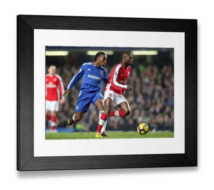 Framed Print : William Gallas (Arsenal) Didier Drogba (Chelsea). Chelsea 2: 0 Arsenal. Barclays Premier League Framed Print : William Gallas (Arsenal) Didier Drogba (Chelsea). Chelsea 2: 0 Arsenal. Barclays Premier League