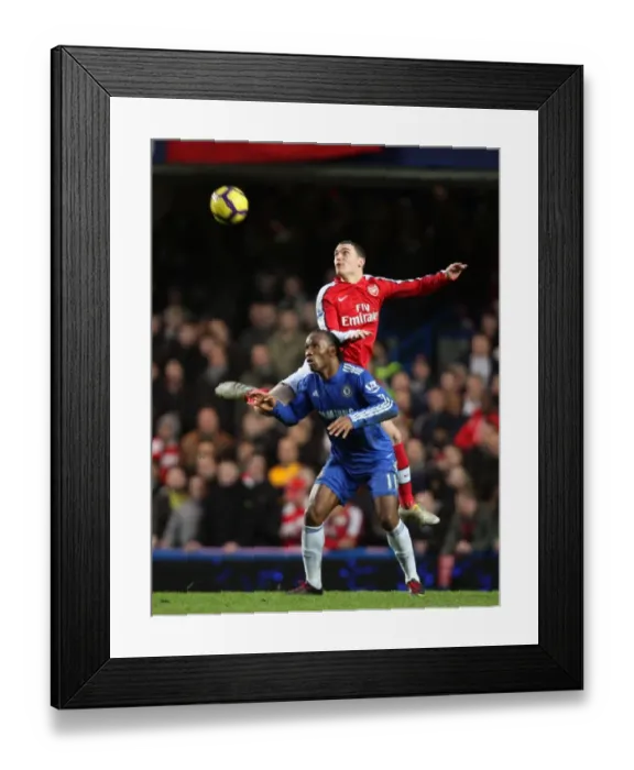 Framed Print : Thomas Vermaelen (Arsenal) Didier Drogba (Chelsea). Chelsea 2: 0 Arsenal