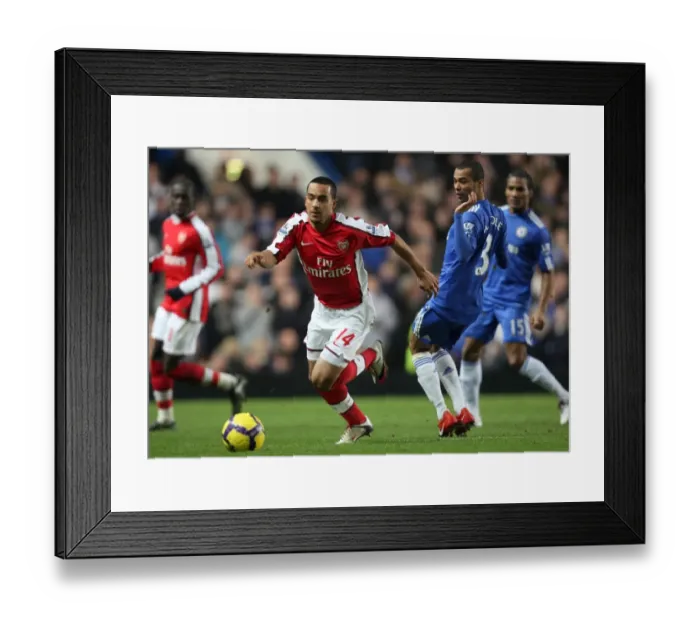 Framed Print : The Rivalry: Walcott vs. Cole at Stamford Bridge - Chelsea's 2-0 Victory over Arsenal in the Premier League Framed Print : The Rivalry: Walcott vs. Cole at Stamford Bridge - Chelsea's 2-0 Victory over Arsenal in the Premier League