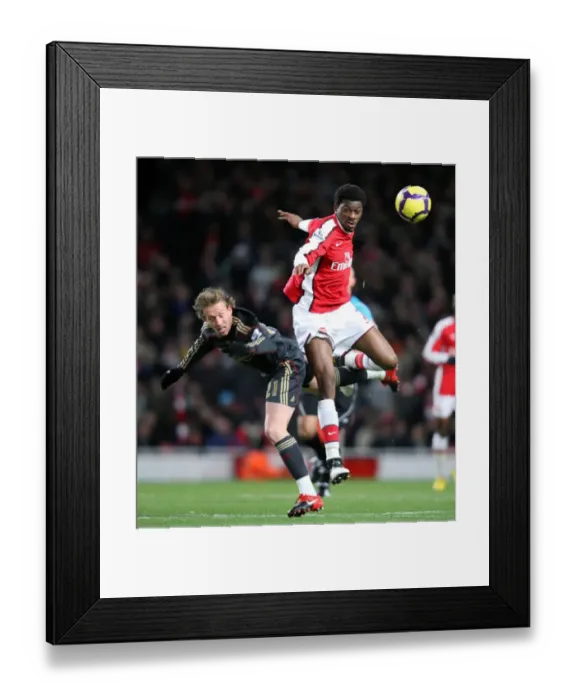 Framed Print : Abou Diaby (Arsenal) Lucas Leiva (Liverpool). Arsenal 1: 0 Liverpool. Barclays Premier League Framed Print : Abou Diaby (Arsenal) Lucas Leiva (Liverpool). Arsenal 1: 0 Liverpool. Barclays Premier League