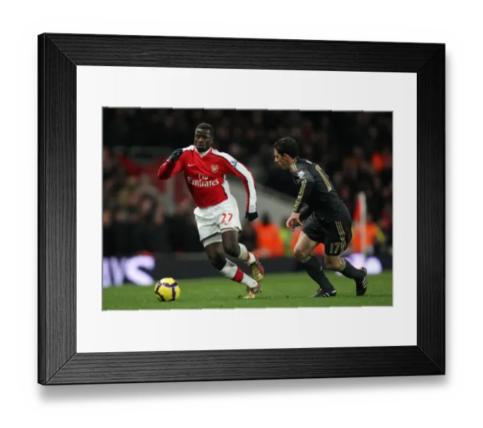 Framed Print : Emmanuel Eboue (Arsenal) Maxi Rodriguez (Liverpool). Arsenal 1: 0 Liverpool Framed Print : Emmanuel Eboue (Arsenal) Maxi Rodriguez (Liverpool). Arsenal 1: 0 Liverpool
