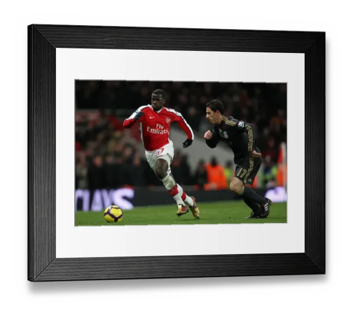 Framed Print : Emmnuel Eboue (Arsenal) Maxi Rodriguez (Liverpool). Arsenal 1: 0 Liverpool Framed Print : Emmnuel Eboue (Arsenal) Maxi Rodriguez (Liverpool). Arsenal 1: 0 Liverpool
