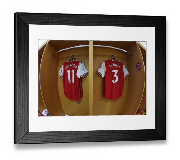 Framed Print : Arsenal FC: Torreira and Tierney's Shirts in the Changing Room before Arsenal v AFC Bournemouth (2019-20)
