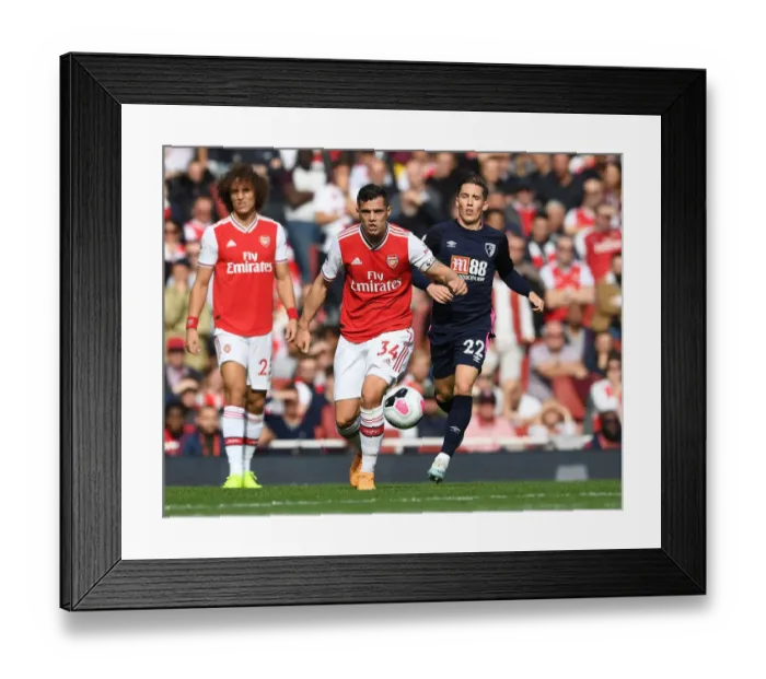 Framed Print : Granit Xhaka Breaks Past Harry Wilson: Arsenal vs. AFC Bournemouth, Premier League 2019-20