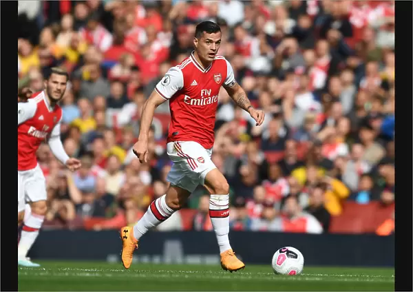 Granit Xhaka: Arsenal's Midfield Maestro in Action vs. AFC Bournemouth, Premier League 2019-20