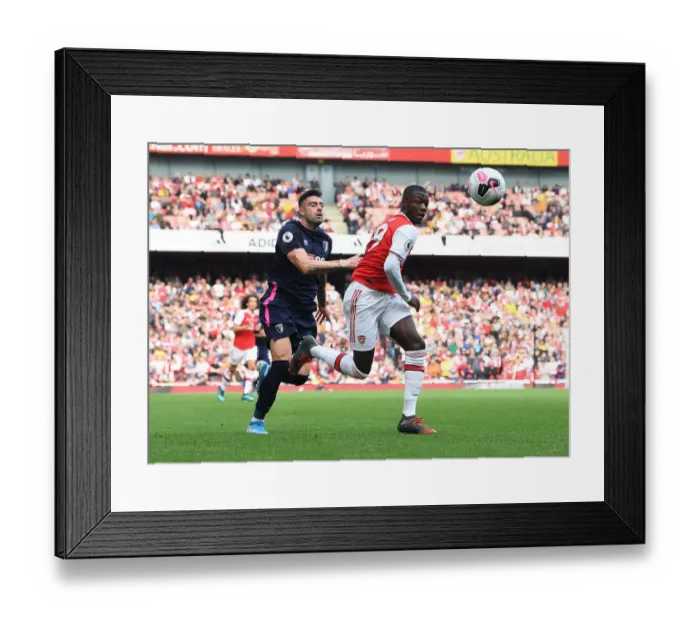 Framed Print : Pepe's Sneaky Moves: Arsenal Star Outwits Bournemouth's Rico in Exciting Premier League Showdown Framed Print : Pepe's Sneaky Moves: Arsenal Star Outwits Bournemouth's Rico in Exciting Premier League Showdown