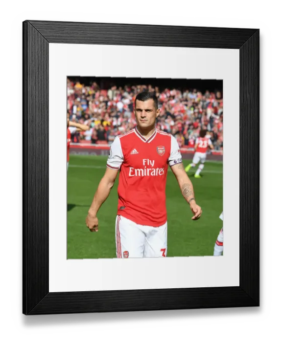 Framed Print : Arsenal's Granit Xhaka at Emirates Stadium before Arsenal v AFC Bournemouth (2019-20)