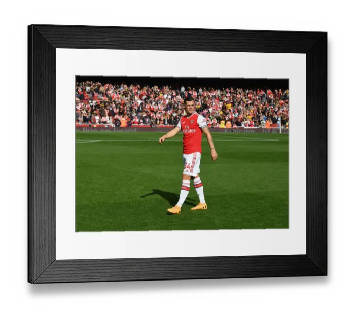 Framed Print : Arsenal's Granit Xhaka Prepares for Arsenal v AFC Bournemouth in Premier League Action