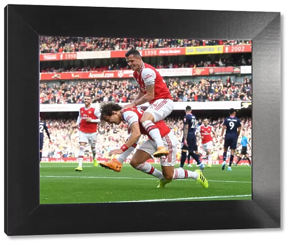 Arsenal's David Luiz and Granit Xhaka: Celebrating a Goal Against AFC Bournemouth, Premier League 2019-20