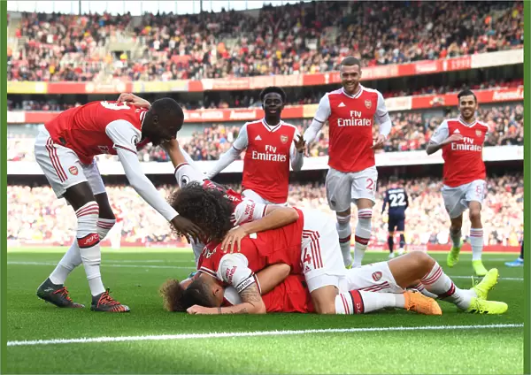 Arsenal's David Luiz Scores and Celebrates with Teammates against AFC Bournemouth (2019-20)