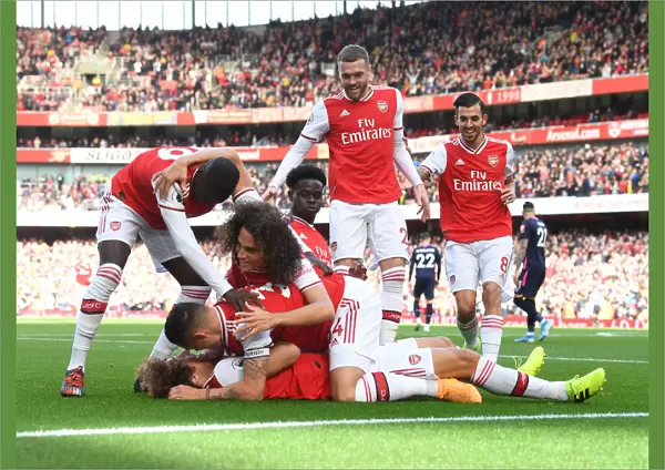 Arsenal Celebrate: Luiz Scores Against Bournemouth in 2019-20 Premier League