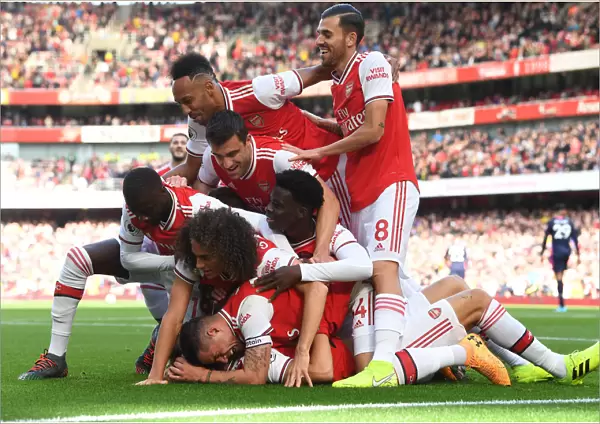 Arsenal's Thrilling Team Goal: David Luiz Scores and Celebrates with Team against AFC Bournemouth (2019-20)