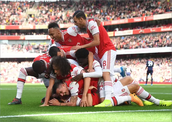 Arsenal's David Luiz Scores and Celebrates with Team against AFC Bournemouth (2019-20)