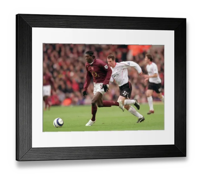 Framed Print : Adebayor's Strike: Arsenal Edge Past Liverpool 2-1 in FA Premiership Clash Framed Print : Adebayor's Strike: Arsenal Edge Past Liverpool 2-1 in FA Premiership Clash
