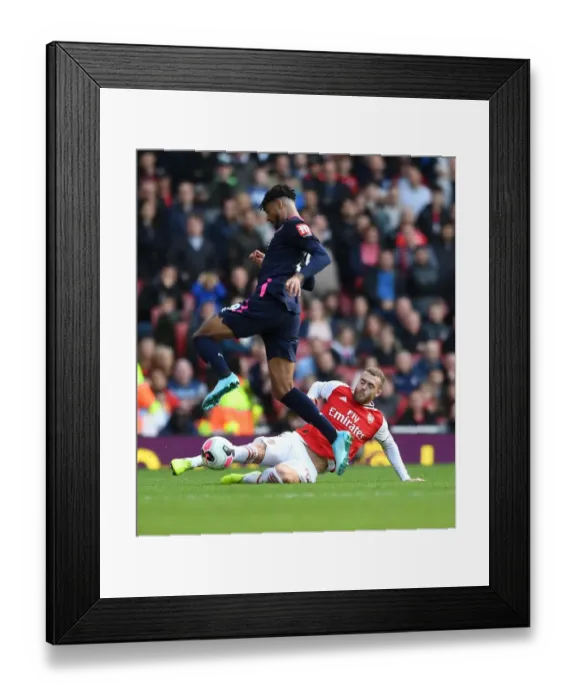 Framed Print : Arsenal vs. AFC Bournemouth: Calum Chambers Tackles Philip Billings in Premier League Clash