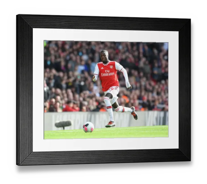 Framed Print : Arsenal's Pepe Shines in Arsenal FC vs AFC Bournemouth Premier League Clash Framed Print : Arsenal's Pepe Shines in Arsenal FC vs AFC Bournemouth Premier League Clash