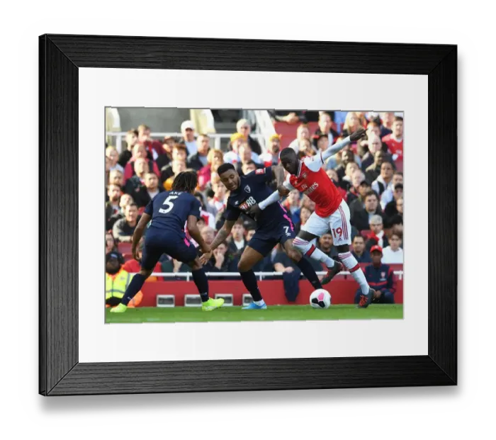 Framed Print : Arsenal's Pepe Clashes with Bournemouth's King and Ake during the 2019-20 Premier League Match