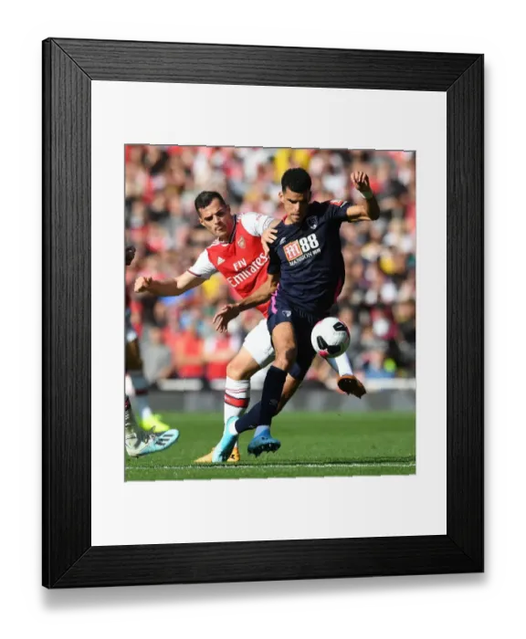 Framed Print : Arsenal vs Bournemouth: Xhaka vs Solanke Clash in Premier League Showdown