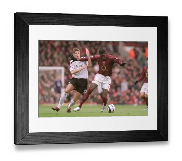 Framed Print : Emmanuel Adebayor (Arsenal) Steven Gerrard (Liverpool). Arsenal 2: 1 Liverpool Framed Print : Emmanuel Adebayor (Arsenal) Steven Gerrard (Liverpool). Arsenal 2: 1 Liverpool