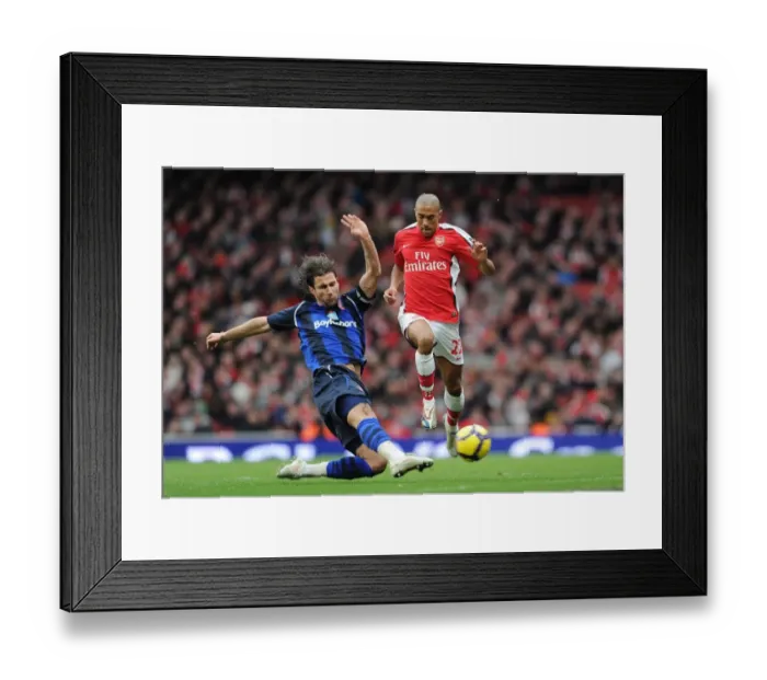 Framed Print : Gael Clichy (Arsenal) Lorik Cana (Sunderland). Arsenal 2: 0 Sunderland, Barclays Premier League