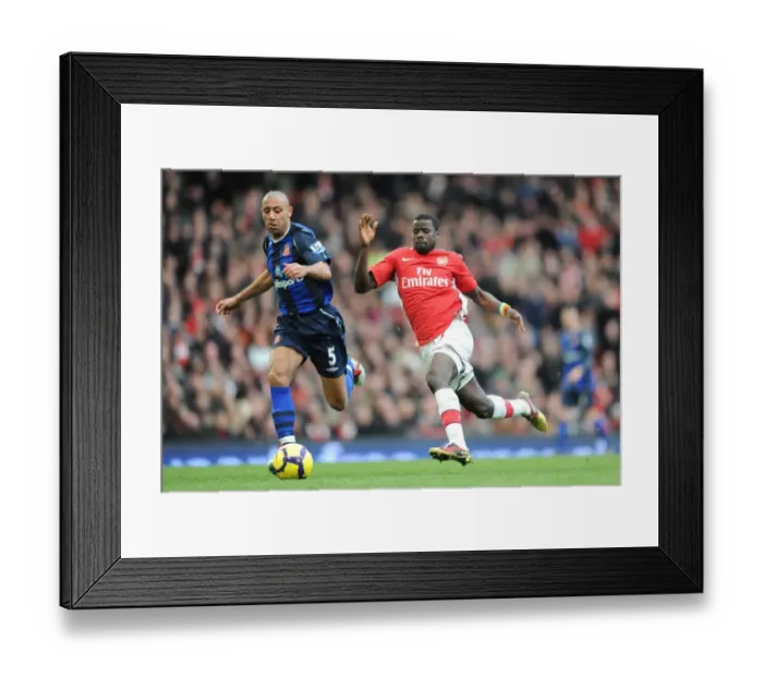 Framed Print : Arsenal's Eboue and Ferdinand Clash in Arsenal 2:0 Sunderland, Premier League 2010 Framed Print : Arsenal's Eboue and Ferdinand Clash in Arsenal 2:0 Sunderland, Premier League 2010
