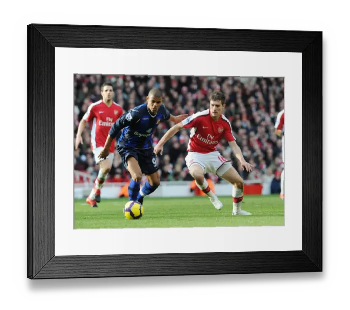 Framed Print : Aaron Ramsey (Arsenal) Frazier Campbell (Sunderland). Arsenal 2: 0 Sunderland Framed Print : Aaron Ramsey (Arsenal) Frazier Campbell (Sunderland). Arsenal 2: 0 Sunderland