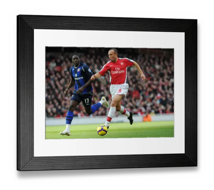 Framed Print : Arsenal's Mikael Silvestre Shuts Down Sunderland's Kenwyne Jones in 2010 Barclays Premier League Match at Emirates Stadium Framed Print : Arsenal's Mikael Silvestre Shuts Down Sunderland's Kenwyne Jones in 2010 Barclays Premier League Match at Emirates Stadium