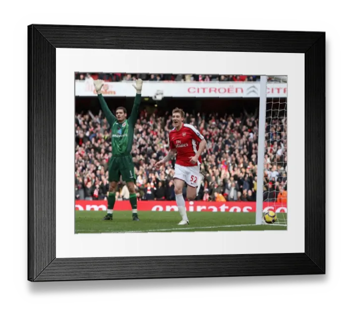 Framed Print : Bendtner's Controversial Goal: Arsenal Takes a 2-0 Lead Over Sunderland