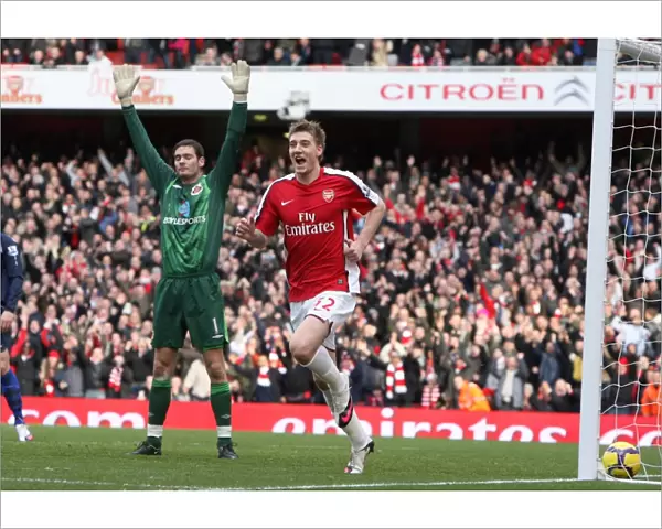 Nicklas Bendtner celebrates scoring Arsenals 1st goal as Craig Gordon
