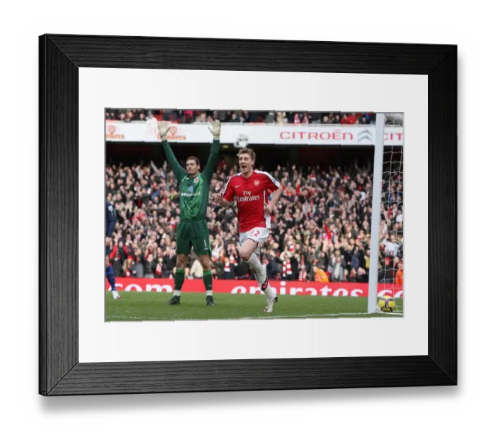 Framed Print : Nicklas Bendtner celebrates scoring Arsenals 1st goal as Craig Gordon