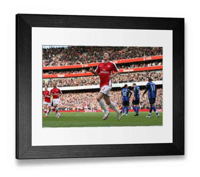 Framed Print : Bendtner's Brilliant Goal: Arsenal Takes 2-0 Lead Over Sunderland in Premier League