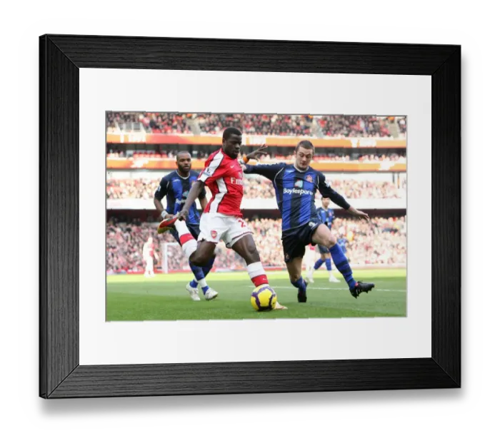 Framed Print : Emmanuel Eboue (Arsenal) George McCartney (Sunderland). Arsenal 2: 0 Sunderland Framed Print : Emmanuel Eboue (Arsenal) George McCartney (Sunderland). Arsenal 2: 0 Sunderland