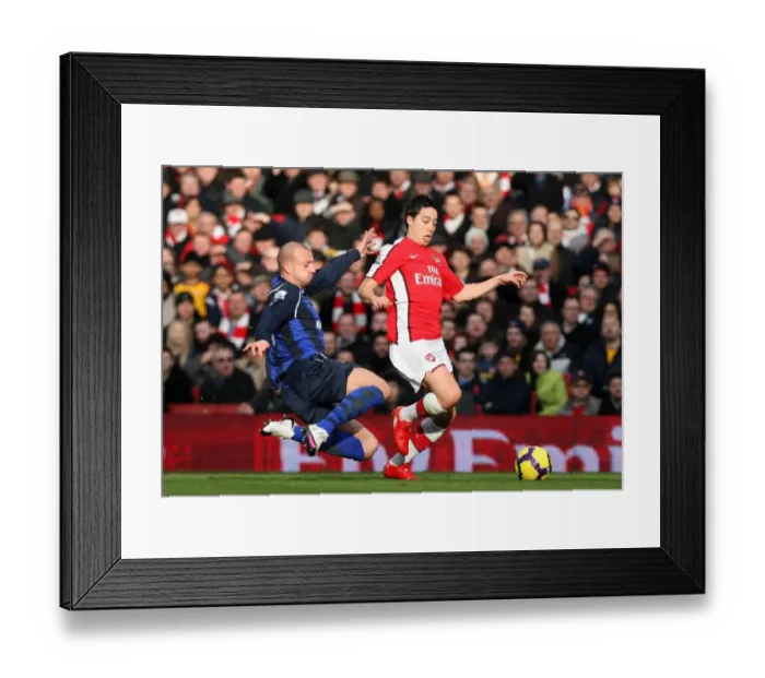 Framed Print : Samir Nasri (Arsenal) Alan Hutton (Sunderland). Arsenal 2: 0 Sunderland