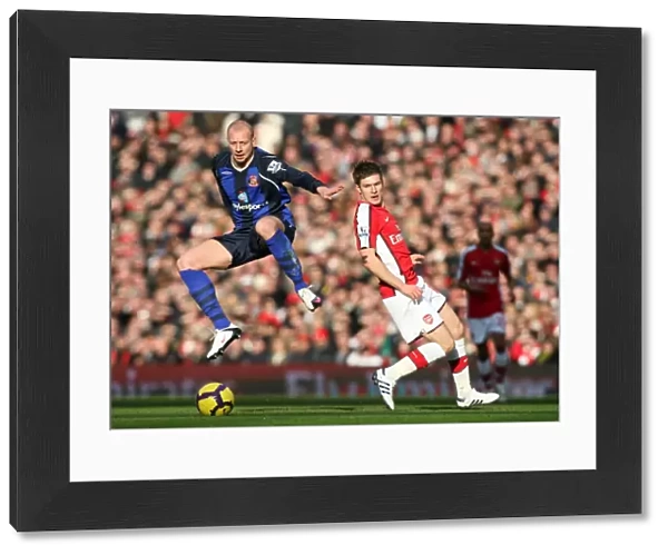 Aaron Ramsey (Arsenal) Alan Hutton (Sunderland). Arsenal 2: 0 Sunderland