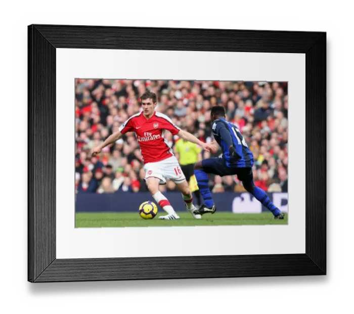 Framed Print : Aaron Ramsey (Arsenal) John Mensah (Sunderland). Arsenal 2: 0 Sunderland