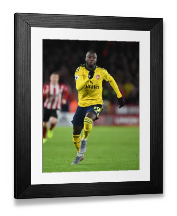 Framed Print : Pepe Leads Arsenal's Charge Against Sheffield United - Premier League 2019-20 Framed Print : Pepe Leads Arsenal's Charge Against Sheffield United - Premier League 2019-20