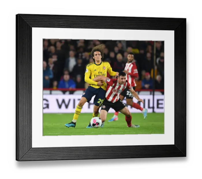Framed Print : Guendouzi vs. Stevens: A Premier League Showdown at Bramall Lane