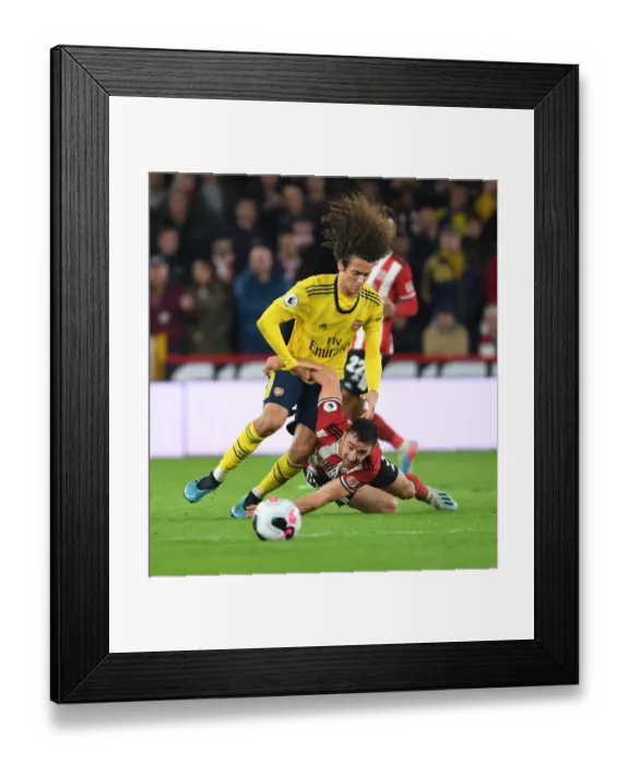 Framed Print : Guendouzi vs. Stevens: A Premier League Battle at Bramall Lane Framed Print : Guendouzi vs. Stevens: A Premier League Battle at Bramall Lane