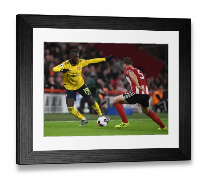 Framed Print : Pepe vs O'Connell: Clash at Bramall Lane - Sheffield United vs Arsenal, Premier League 2019-20 Framed Print : Pepe vs O'Connell: Clash at Bramall Lane - Sheffield United vs Arsenal, Premier League 2019-20