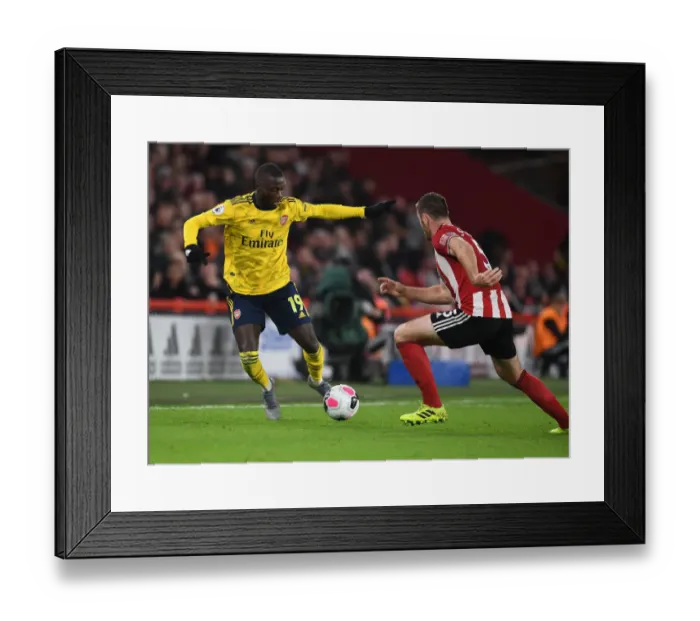 Framed Print : Pepe vs O'Connell: Battle at Bramall Lane - Sheffield United vs Arsenal, Premier League 2019-20 Framed Print : Pepe vs O'Connell: Battle at Bramall Lane - Sheffield United vs Arsenal, Premier League 2019-20