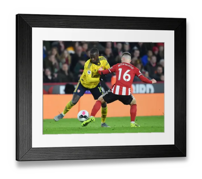 Framed Print : Pepe vs Norwood: A Premier League Showdown - Sheffield United vs Arsenal, 2019-20 Framed Print : Pepe vs Norwood: A Premier League Showdown - Sheffield United vs Arsenal, 2019-20