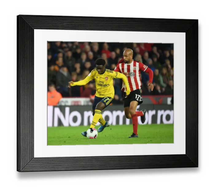 Framed Print : Saka vs McGoldrick: Battle at Bramall Lane - Sheffield United vs Arsenal, Premier League 2019-20 Framed Print : Saka vs McGoldrick: Battle at Bramall Lane - Sheffield United vs Arsenal, Premier League 2019-20