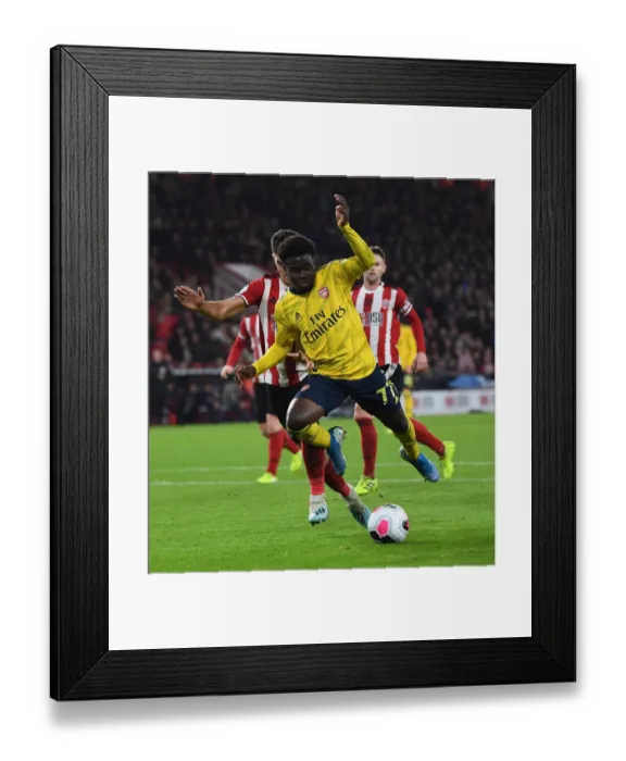 Framed Print : Saka vs Egan: A Battle at Bramall Lane - Sheffield United vs Arsenal, Premier League 2019-20