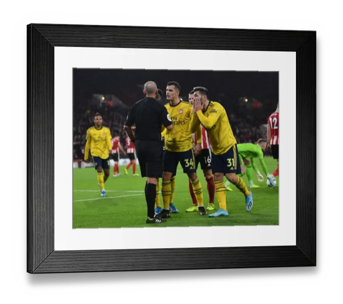 Framed Print : Xhaka and Kolasinac Confront Referee Mike Dean During Sheffield United vs. Arsenal Premier League Clash Framed Print : Xhaka and Kolasinac Confront Referee Mike Dean During Sheffield United vs. Arsenal Premier League Clash