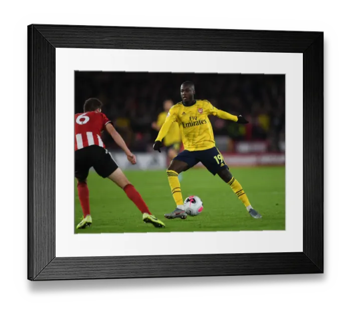 Framed Print : Pepe in Action: Arsenal's Star Winger Shines Against Sheffield United in Premier League 2019-20