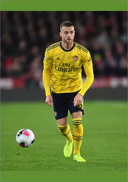 Arsenal's Calum Chambers in Action against Sheffield United - Premier League Showdown (2019-20)